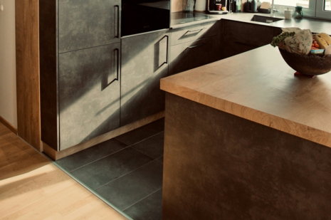 a-kitchen-with-a-bowl-of-fruit-on-the-counter.jpg a kitchen with a bowl of fruit on the counter